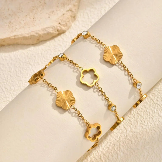 Armkette in Gold mit Blüten- und Fächer-Elementen