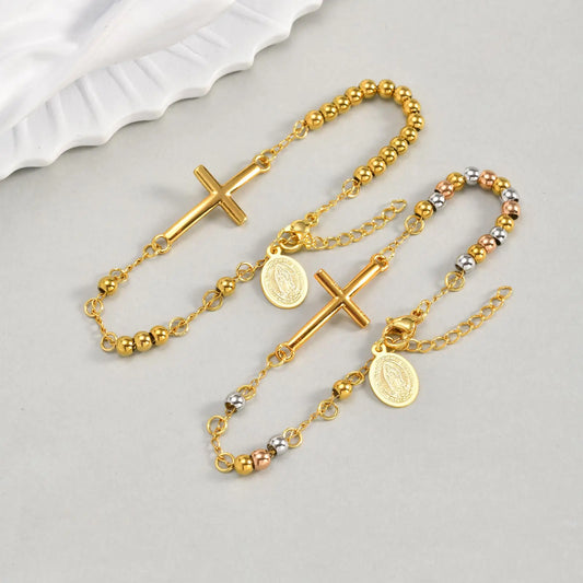 Armkette in Gold mit Kreuz- und Medaillon-Anhängern