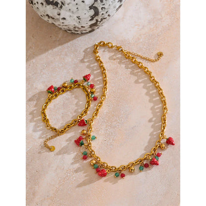Elegantes Armband mit Erdbeer - Anhängern